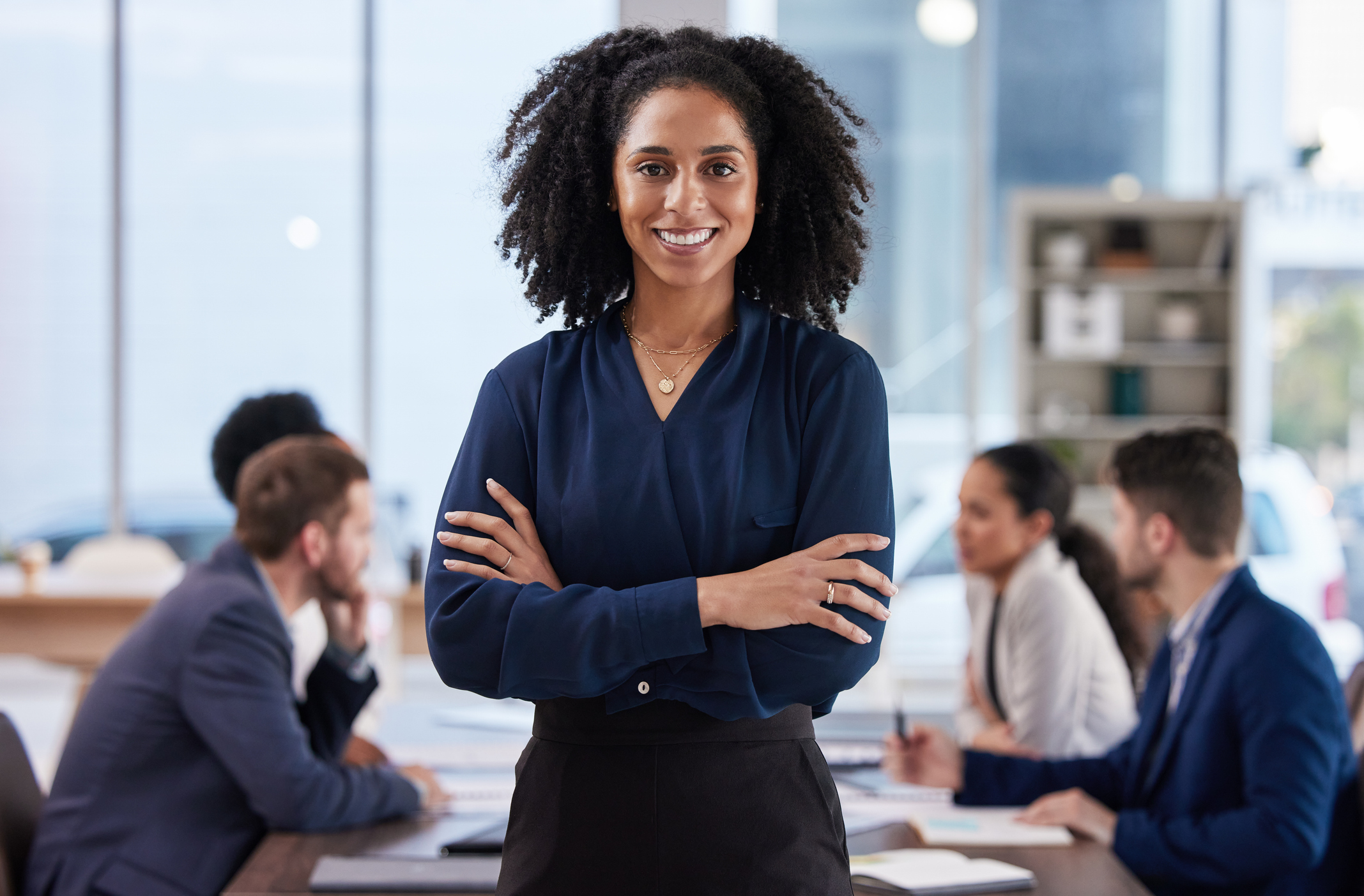 Diverse executive team at boardroom table